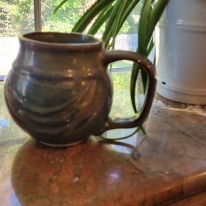 Beautiful condition like new signed pottery mug